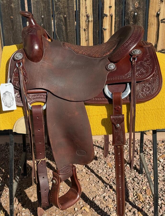 Ranch western saddle — traditional tooling, stout horn, full skirts